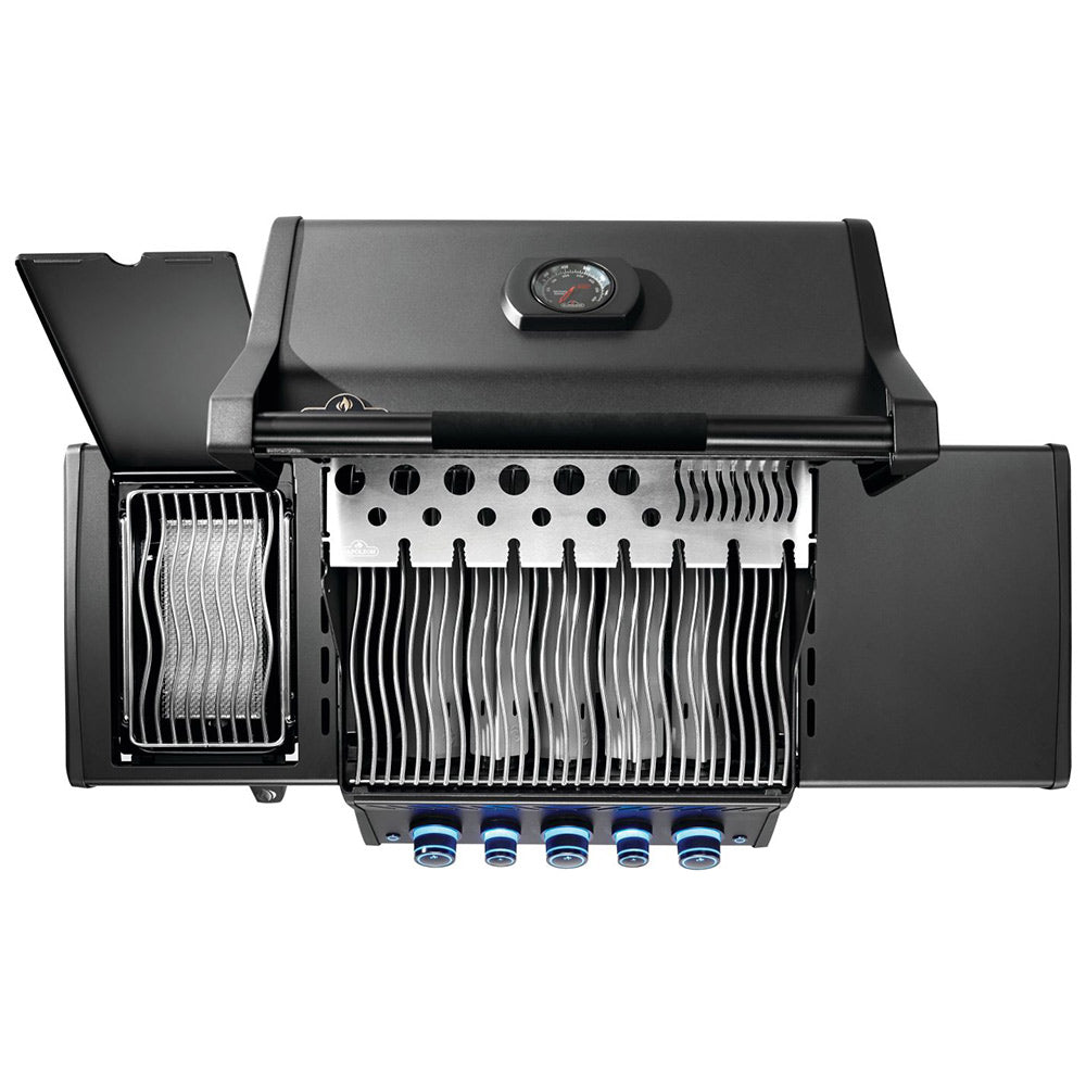 Gas grill with hood open, grill grates exposed, and side burner chamber