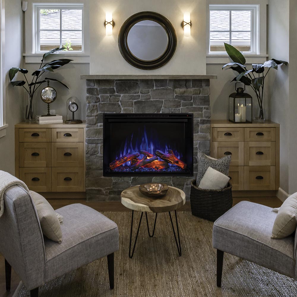 Electric fireplace insert with black frame, stone surround, and blue-orange flame effect