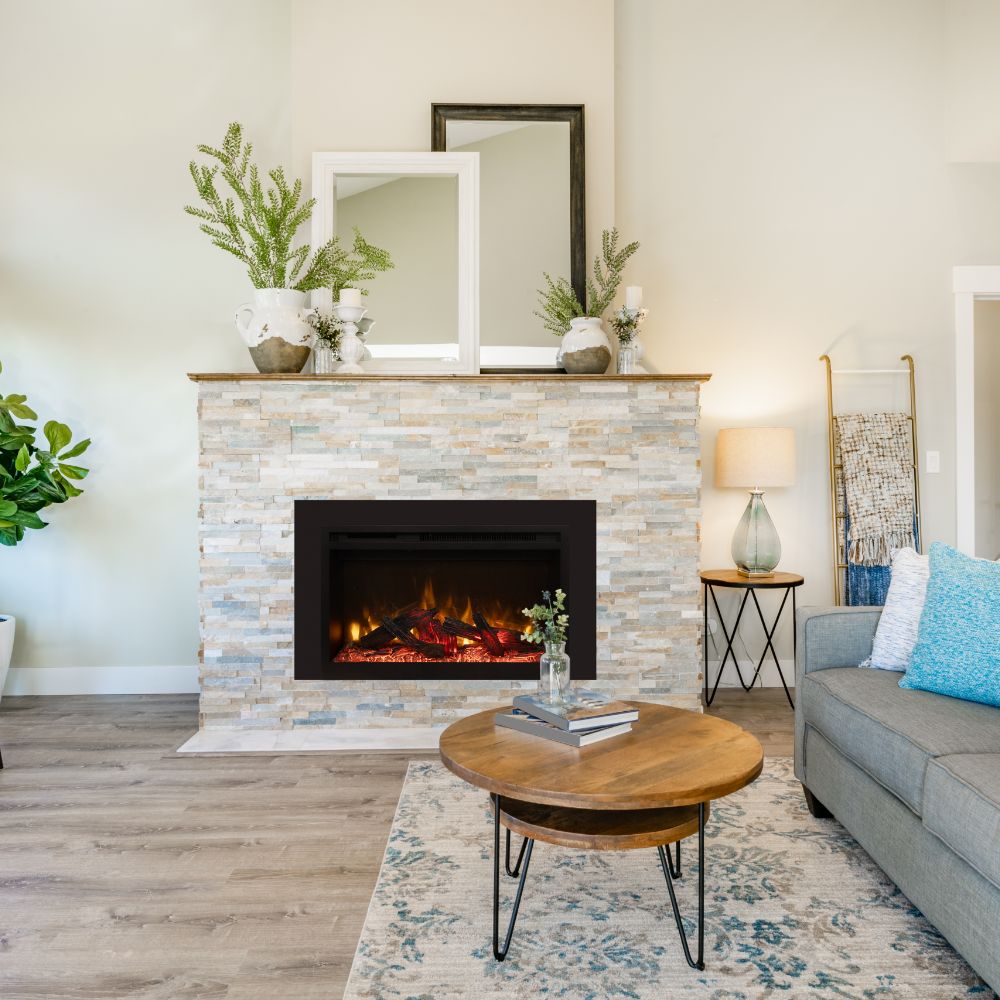 Built-in electric fireplace with rustic stone surround and black firebox, burning flames