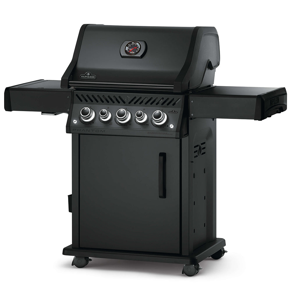 Black gas grill on cart with lid and side shelf, angled front view