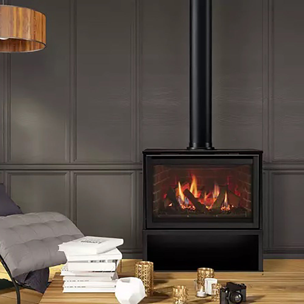 Majestic gas fireplace with black base and lit firebox seen through glass door