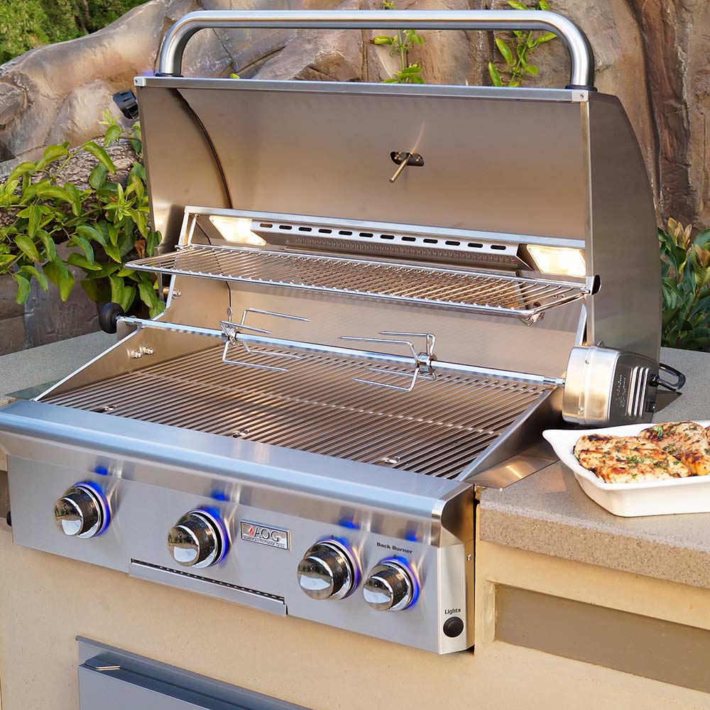 30-inch grill rotisserie kit with enclosed burner area, spit motor, and control knobs