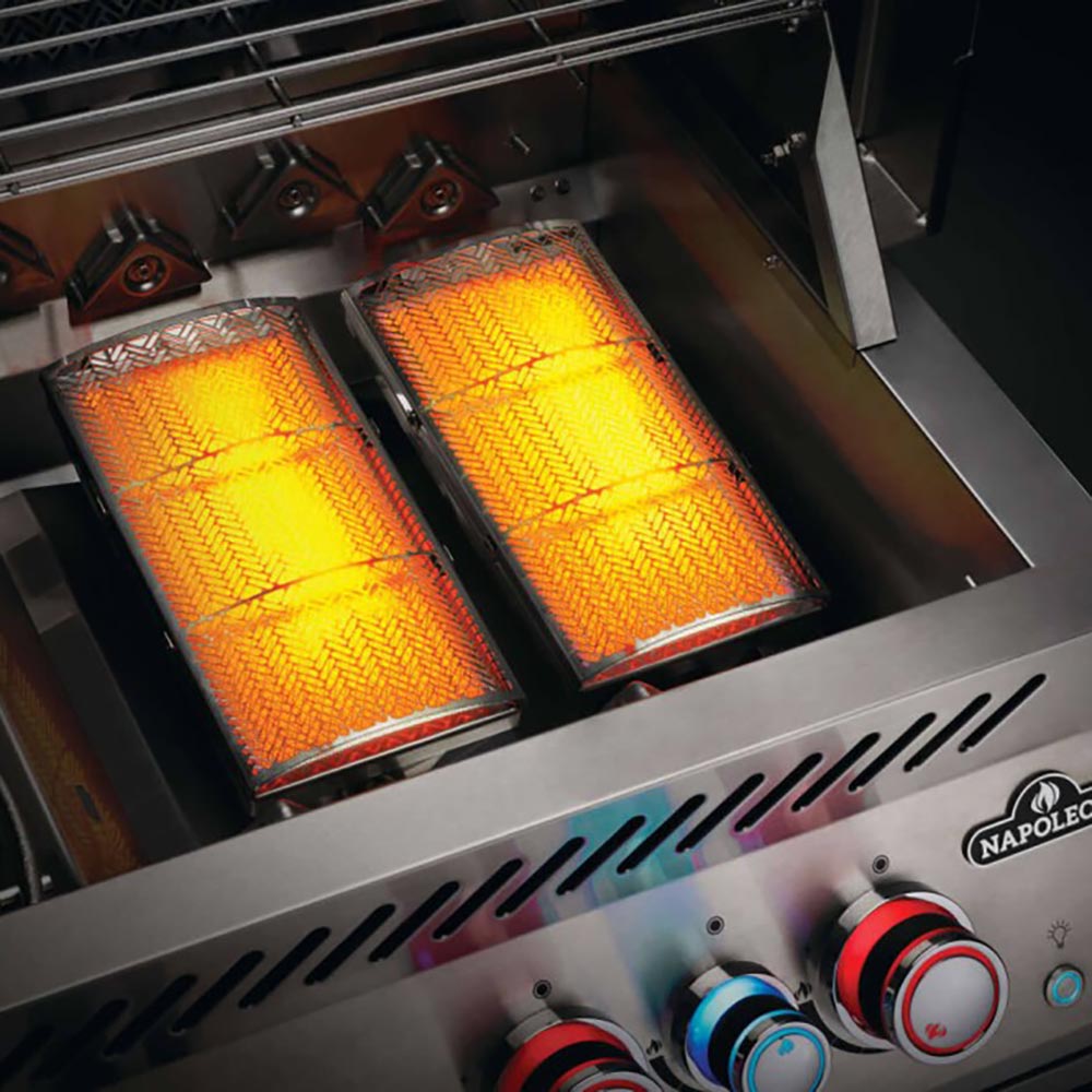 Infrared grill burner panels with bright orange heating elements under a stainless cover