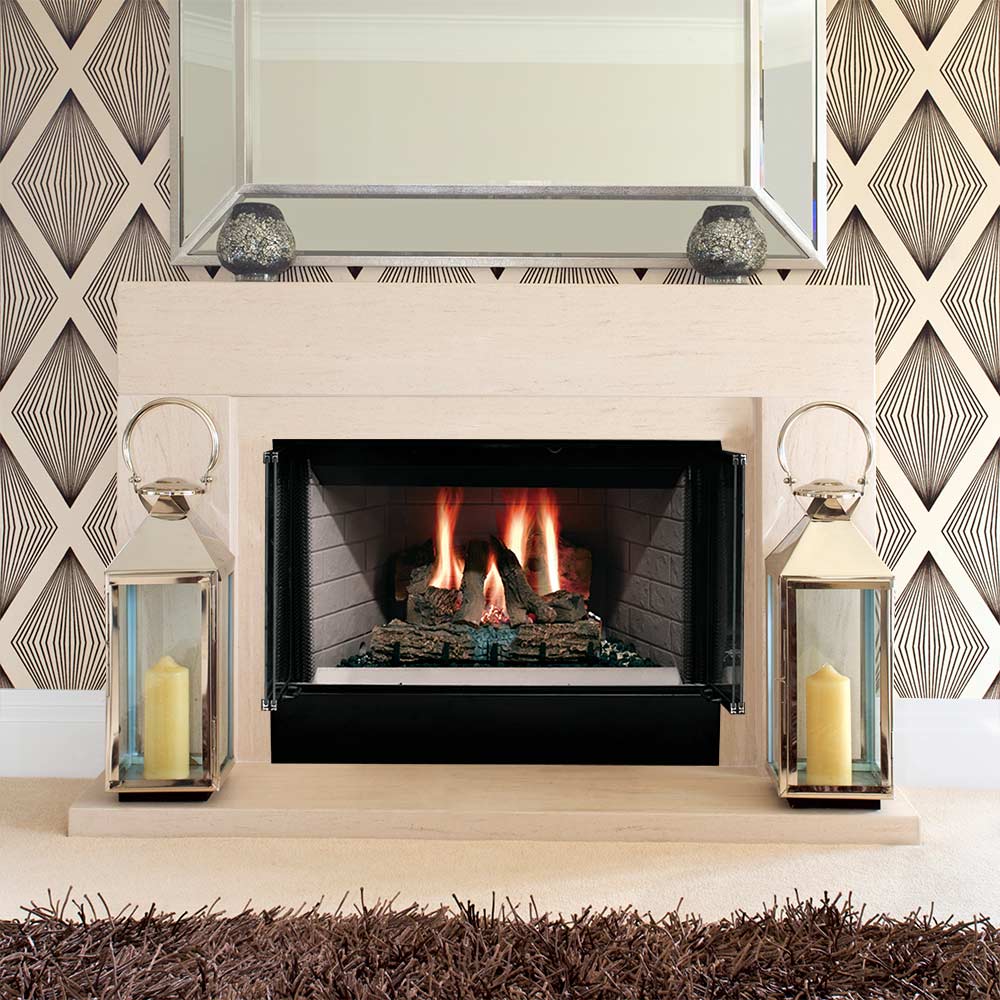 Black wood-burning fireplace insert with open firebox, stone surround, and lanterns on sides