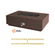 Chocolate concrete gas fire table with stone insert, brass burner tubes, and control