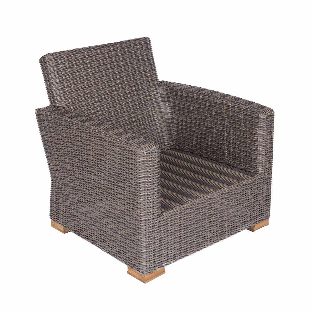 Dark wicker club chair with dark striped seat cushion