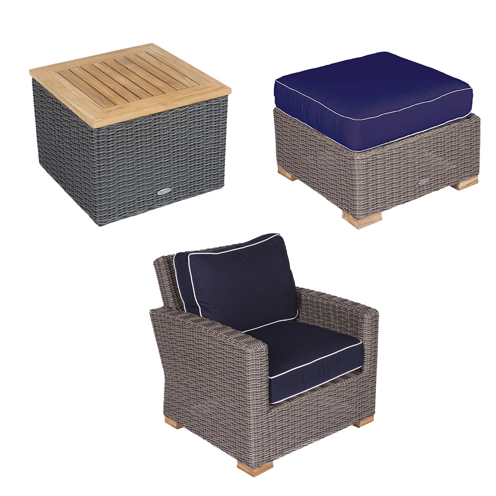 Woven outdoor seating set with navy cushions and white piping, plus ottoman and chair