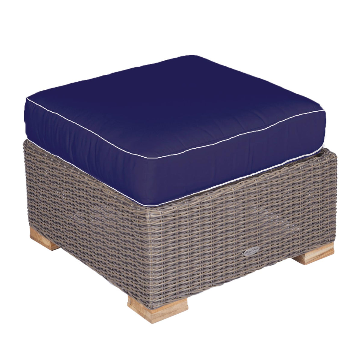 Woven wicker ottoman with navy upholstered cushion and white piping