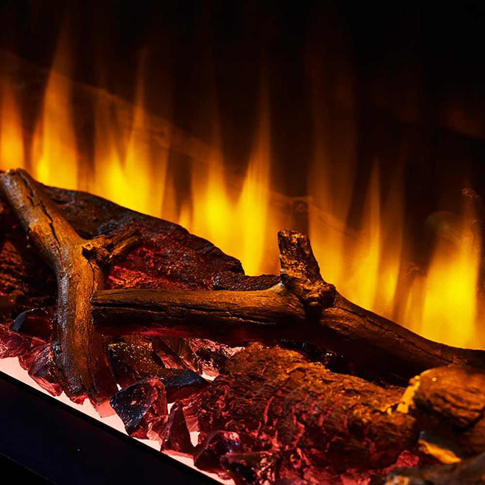 Electric fireplace log set with dark, charred wood logs and glowing ember bed