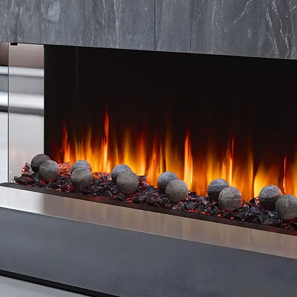 Decorative electric fireplace spheres arranged along the burner bed with flames