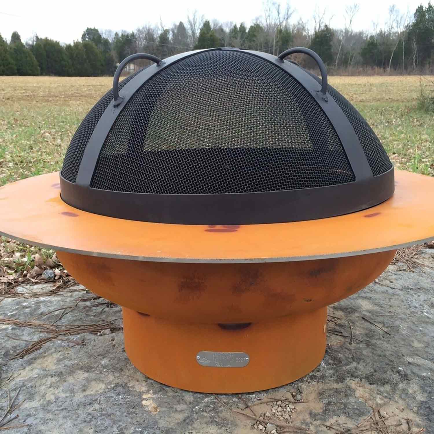Fire pit spark guard with black mesh dome and gray support bars, round screen