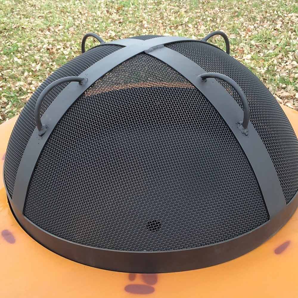 Fire pit spark guard screen with curved black mesh and arched gray braces on top