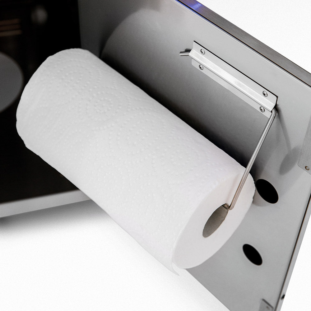 White grill cart with attached paper towel holder in side cabinet