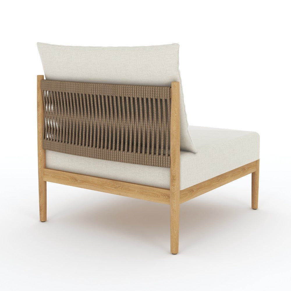 Upholstered insert chair with light beige cushions and woven slatted back panel