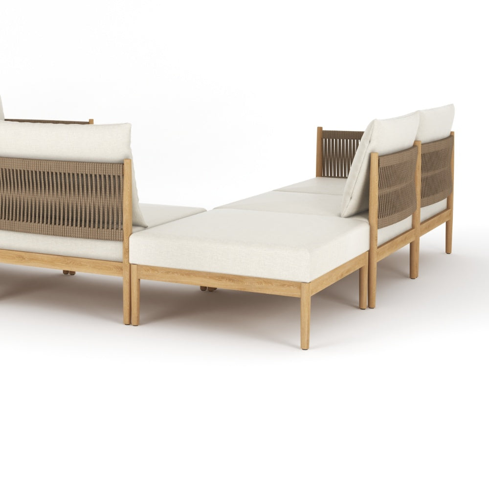 Teak outdoor daybed-style sectional with beige cushions and woven back panels