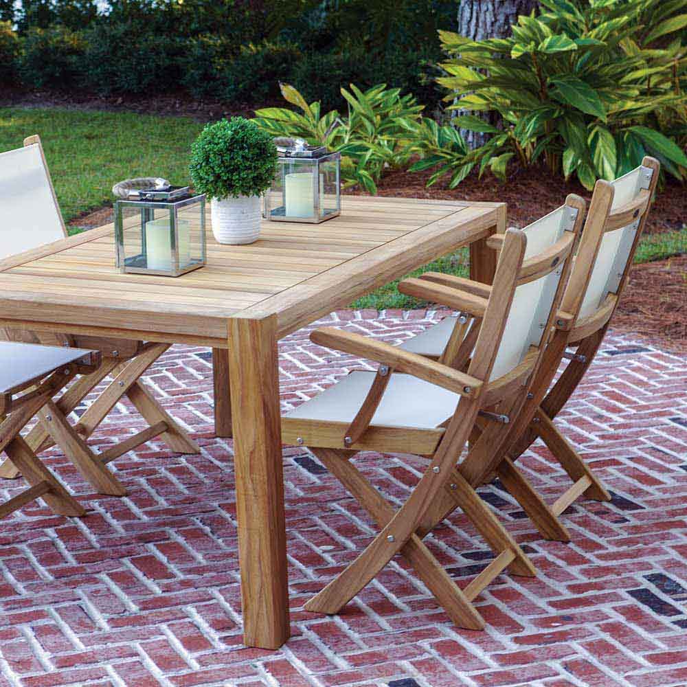 Folding teak arm chair with pale sling seat and backrest, wooden folding frame.