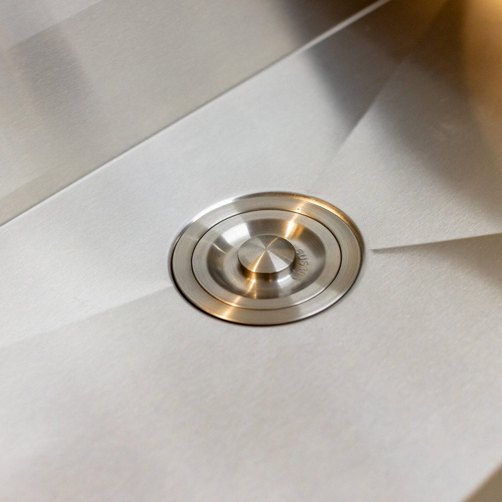 Stainless steel sink drain with centered strainer and flanged rim