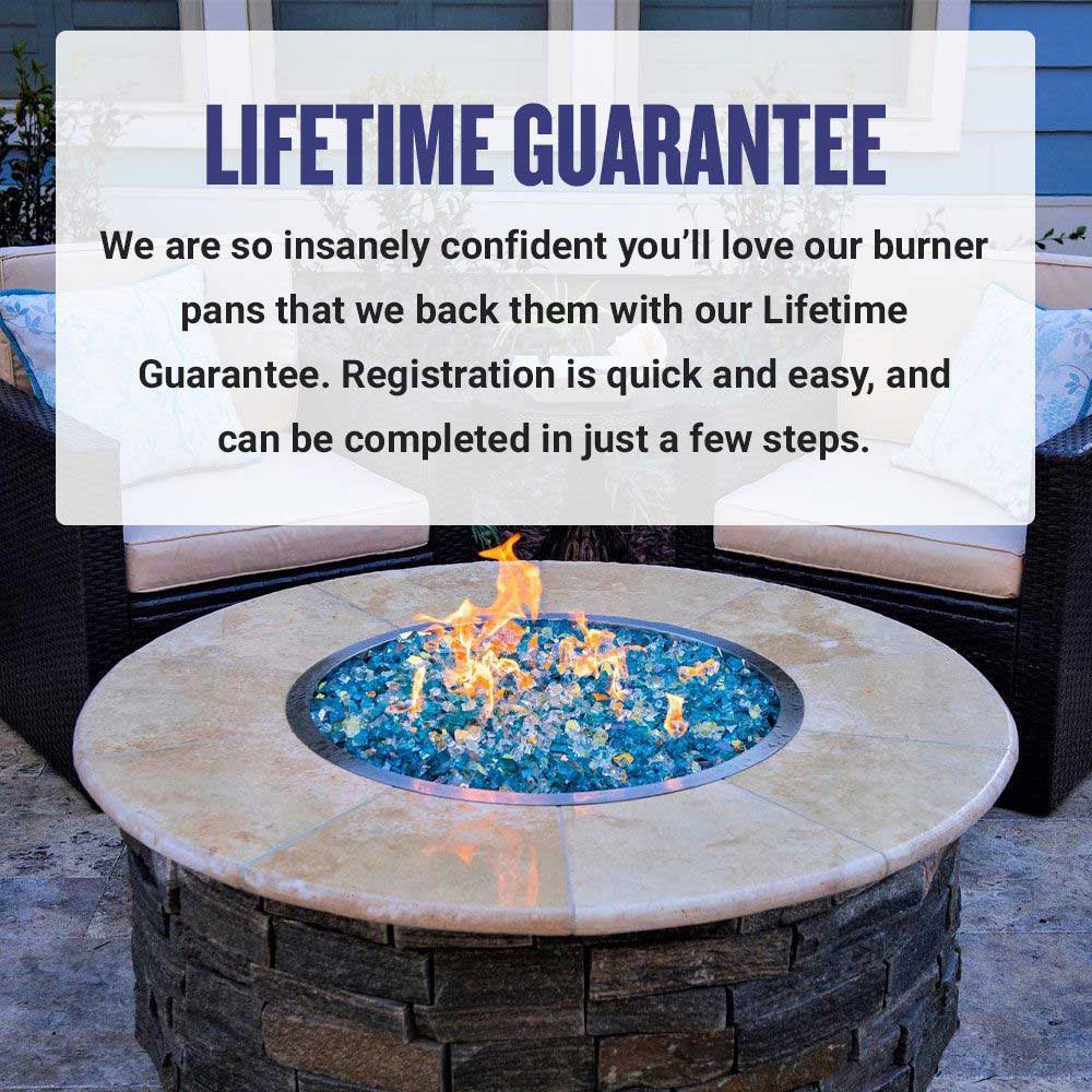 Outdoor round fire pit with flames over a stainless burner pan insert