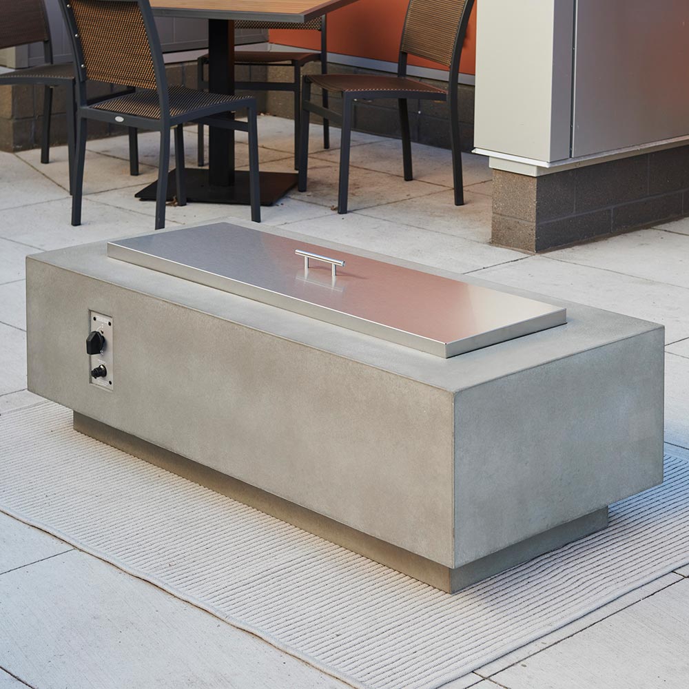 Outdoor linear stainless steel burner cover, flat rectangular top with recessed handles