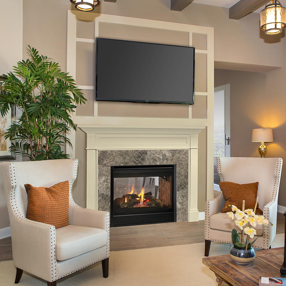Built-in direct vent gas fireplace with black trim and glass front, flames visible