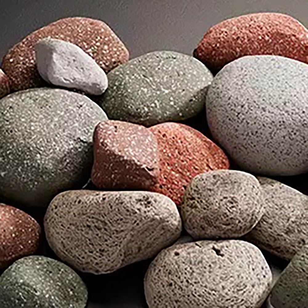 Assorted smooth river stones in gray, red, and dark green tones