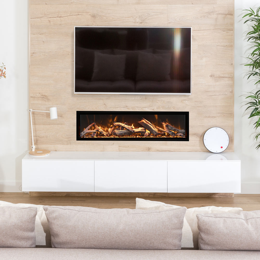 Electric fireplace set into a light wood wall with glowing logs and black trim