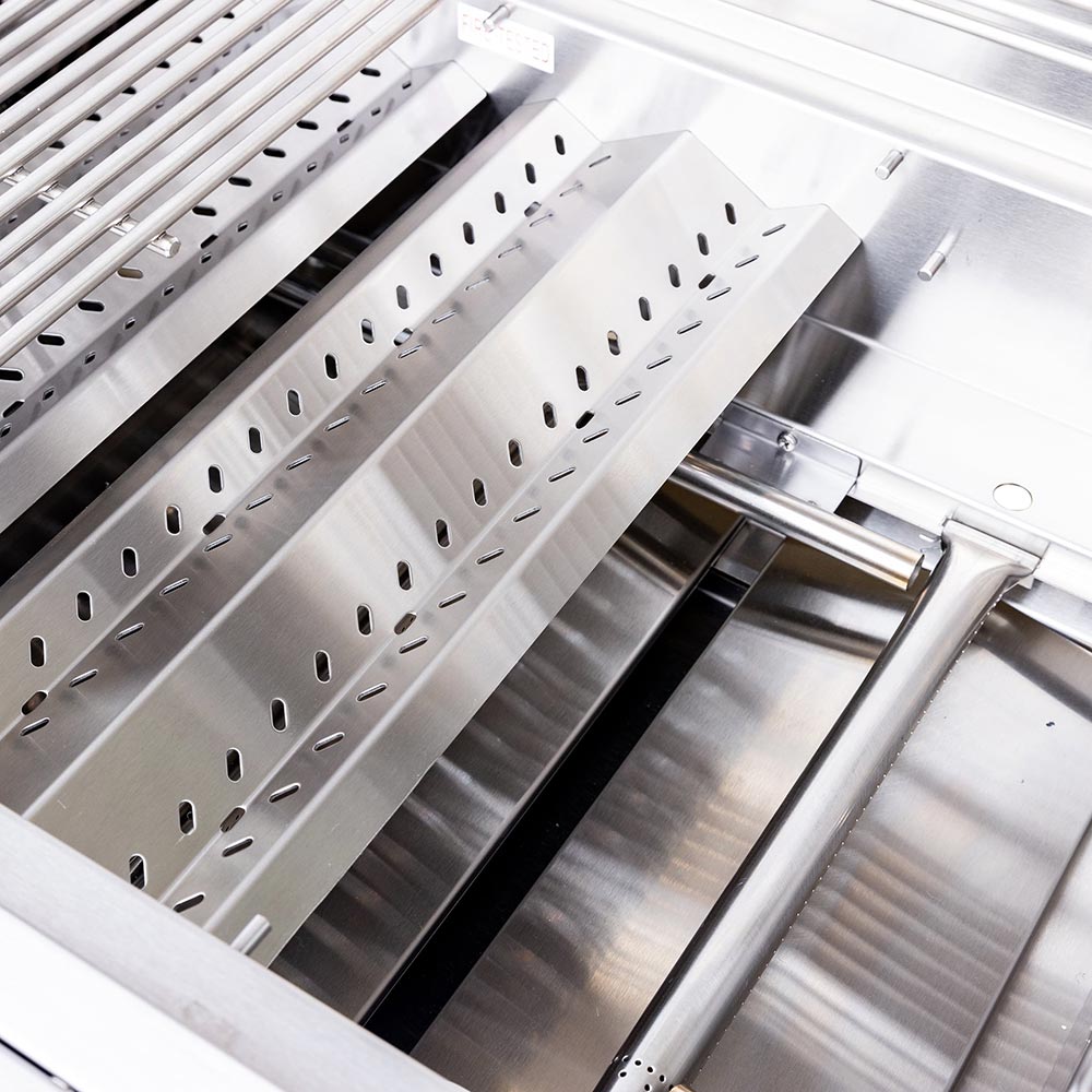 Stainless steel cooking grates and burner shields inside gas grill