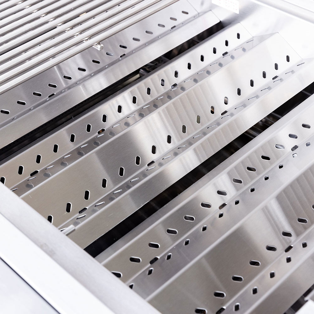 Stainless gas grill cooking grates with evenly spaced slots inside the open hood