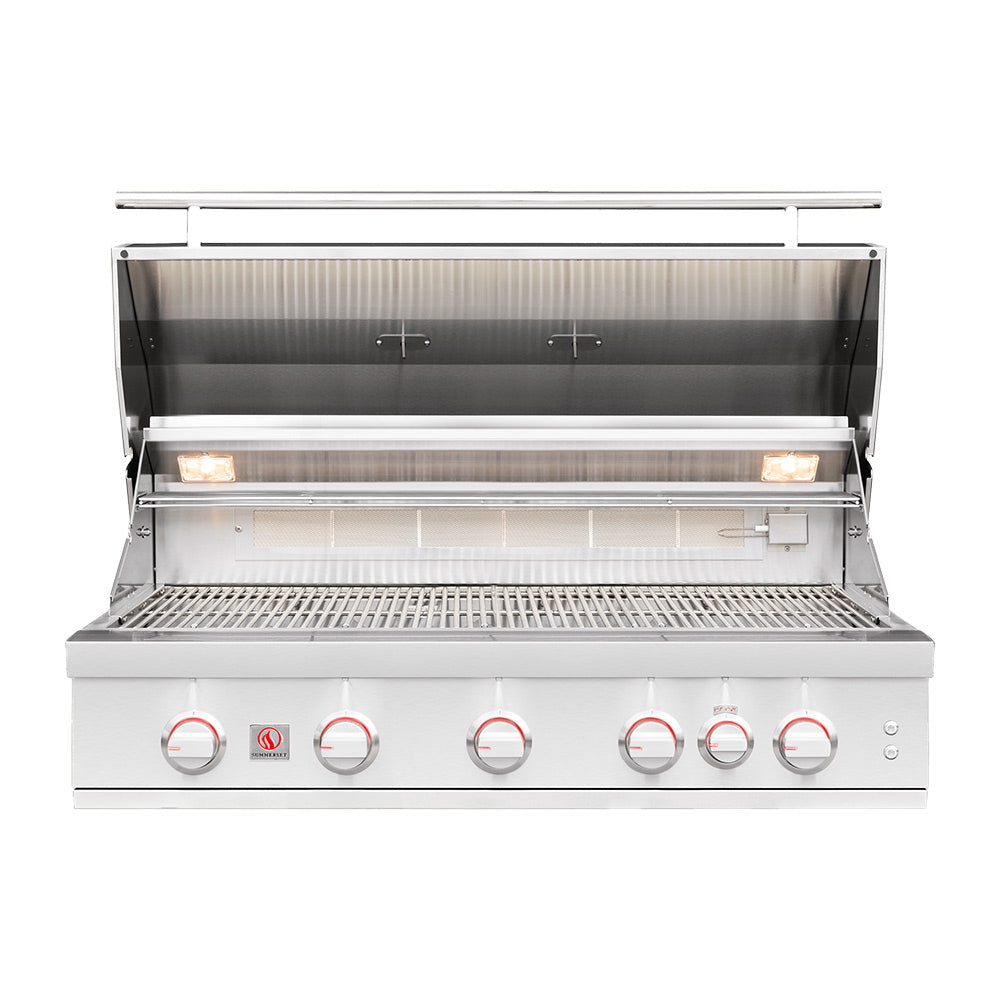 Built-in gas grill with open hood, warming area and cooking grates visible