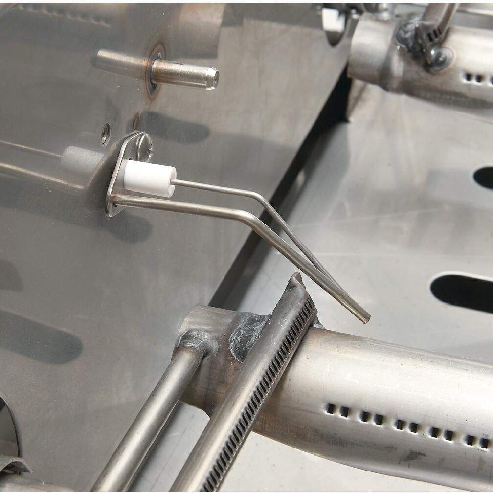 Built-in gas grill burner with metal igniter and control stem
