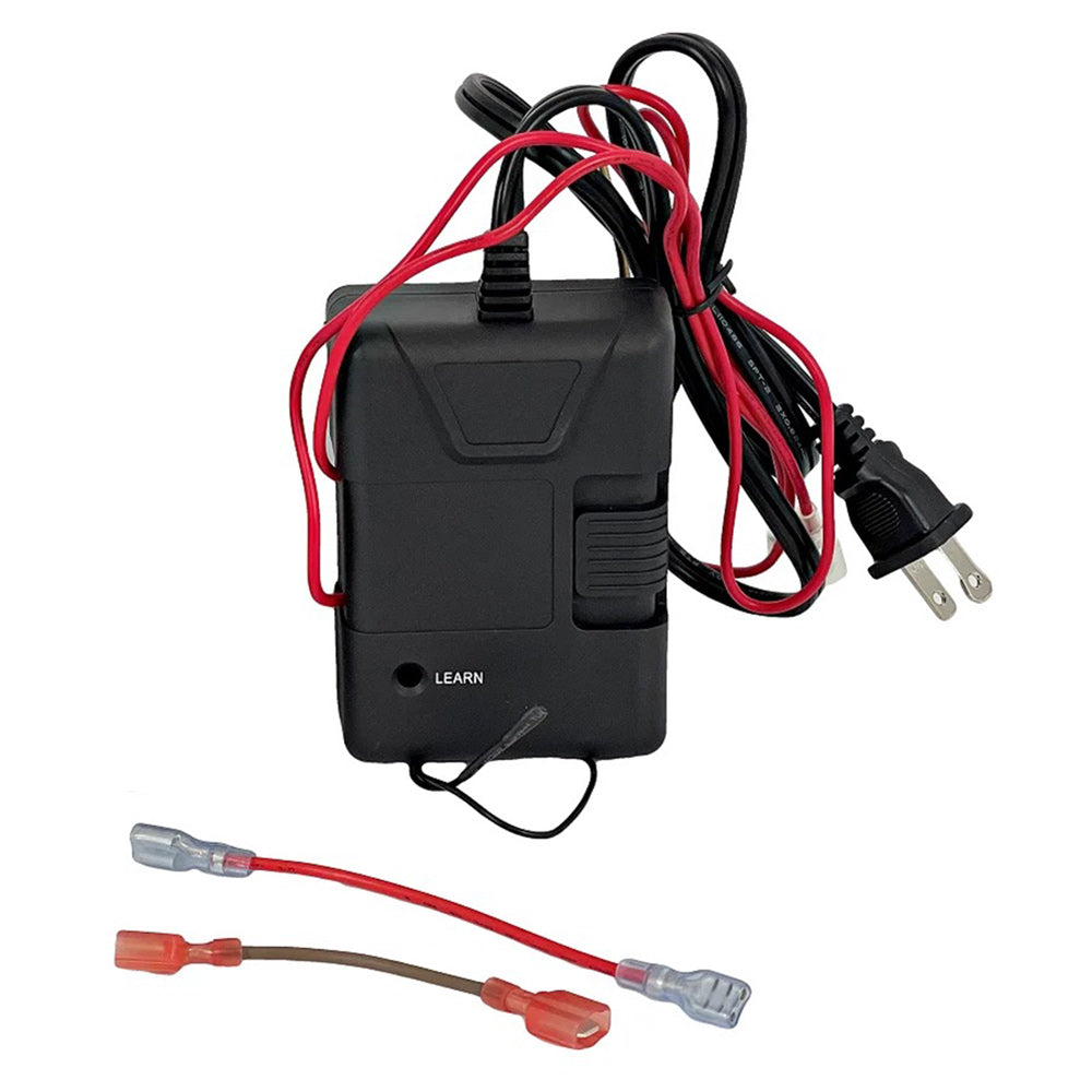 Black receiver box with red and black wiring harness, power plug and learner button