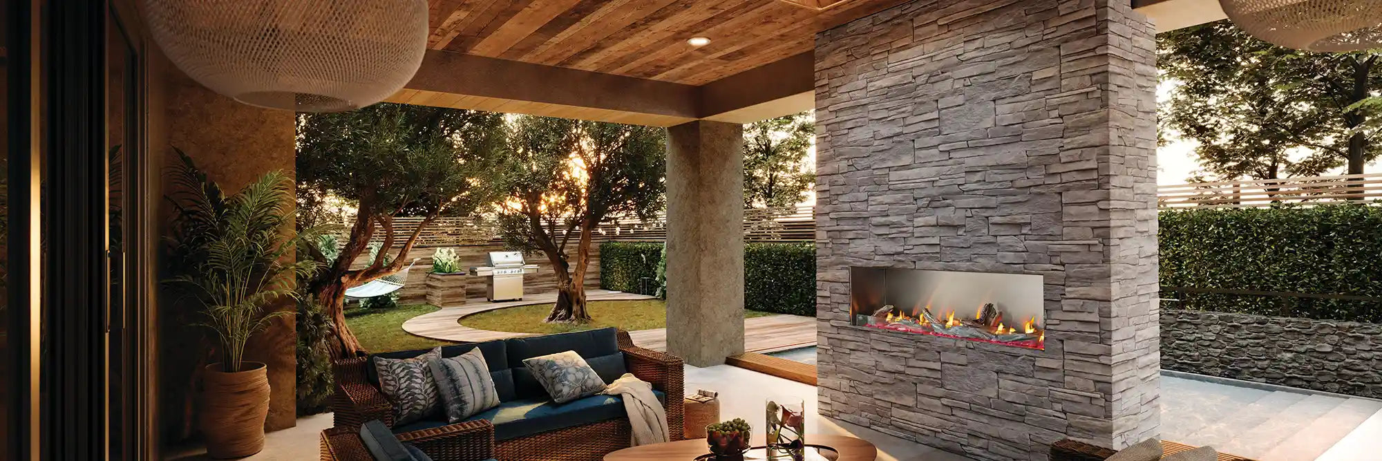 Galaxy Outdoor fireplace in a backyard patio during sunset
