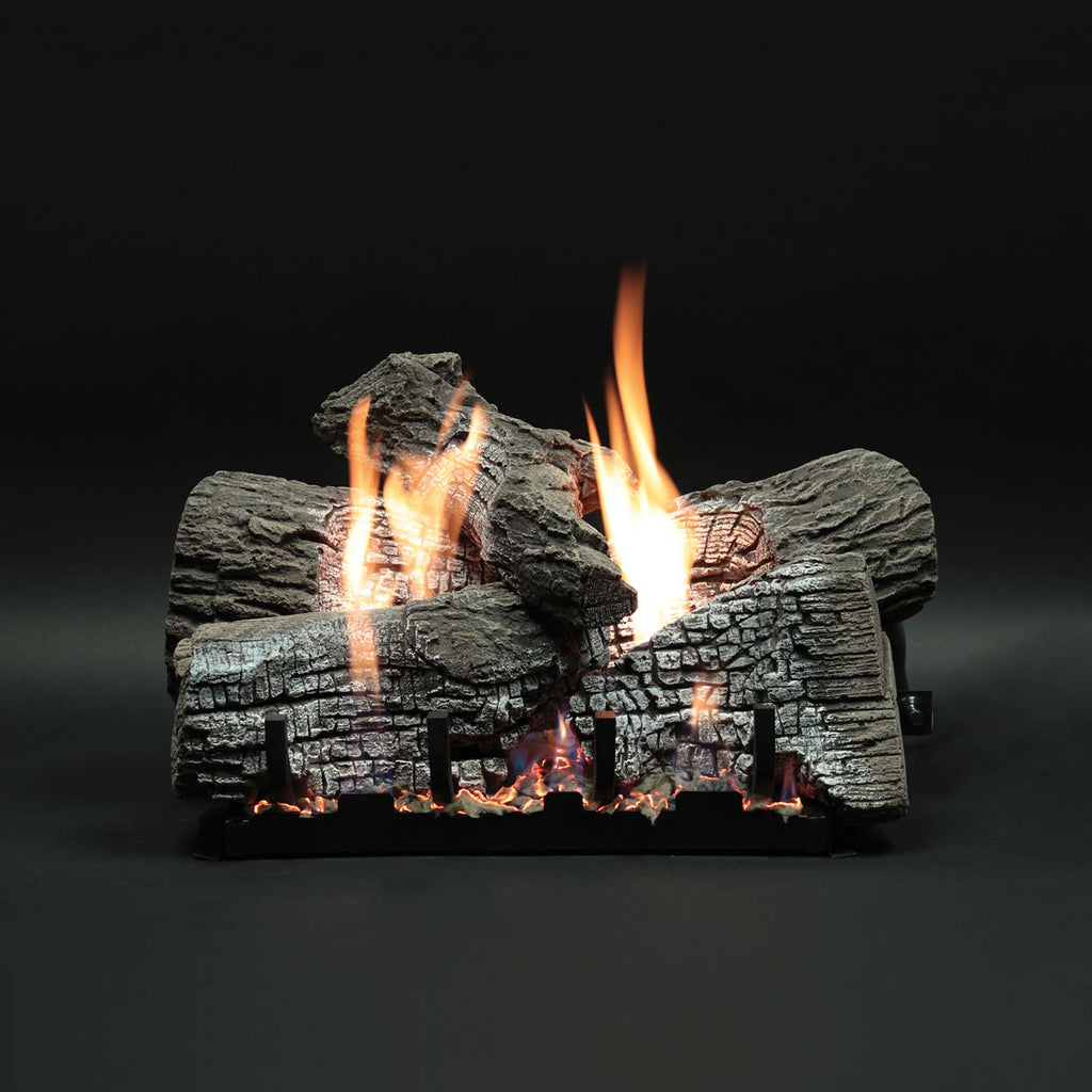 Stacked refractory fireplace logs with flames rising between log pieces