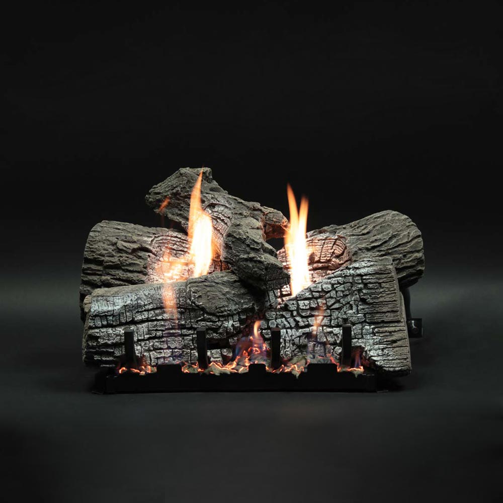 Stacked refractory gas logs with dark gray faux wood and glowing flames