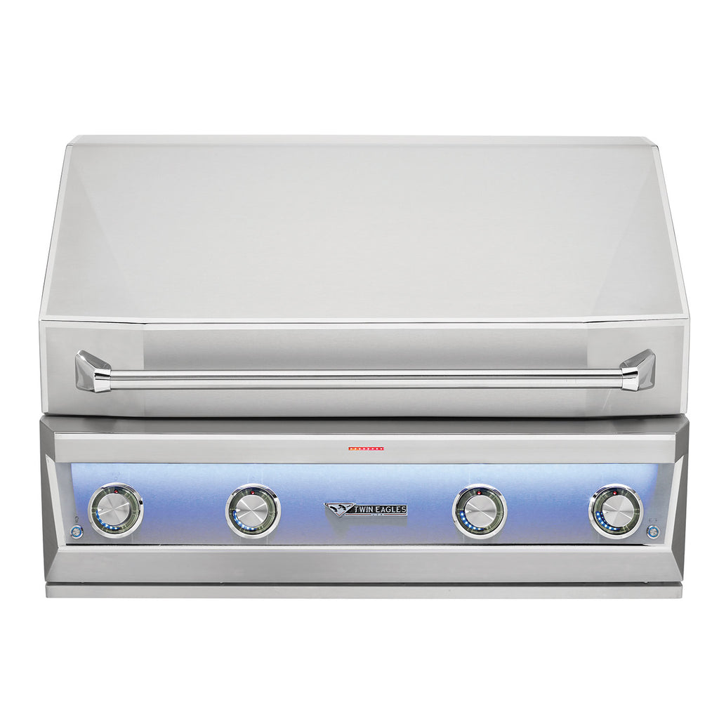 Built-in gas grill with closed hood and four control knobs