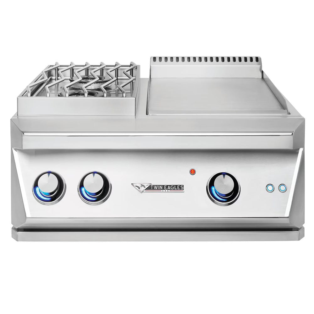 Twin Eagles stainless steel built-in grill with four control knobs and open cooktop