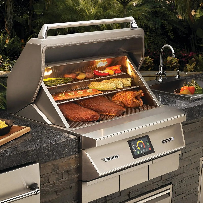 Freestanding pellet smoker grill with ribs and corn cooking inside