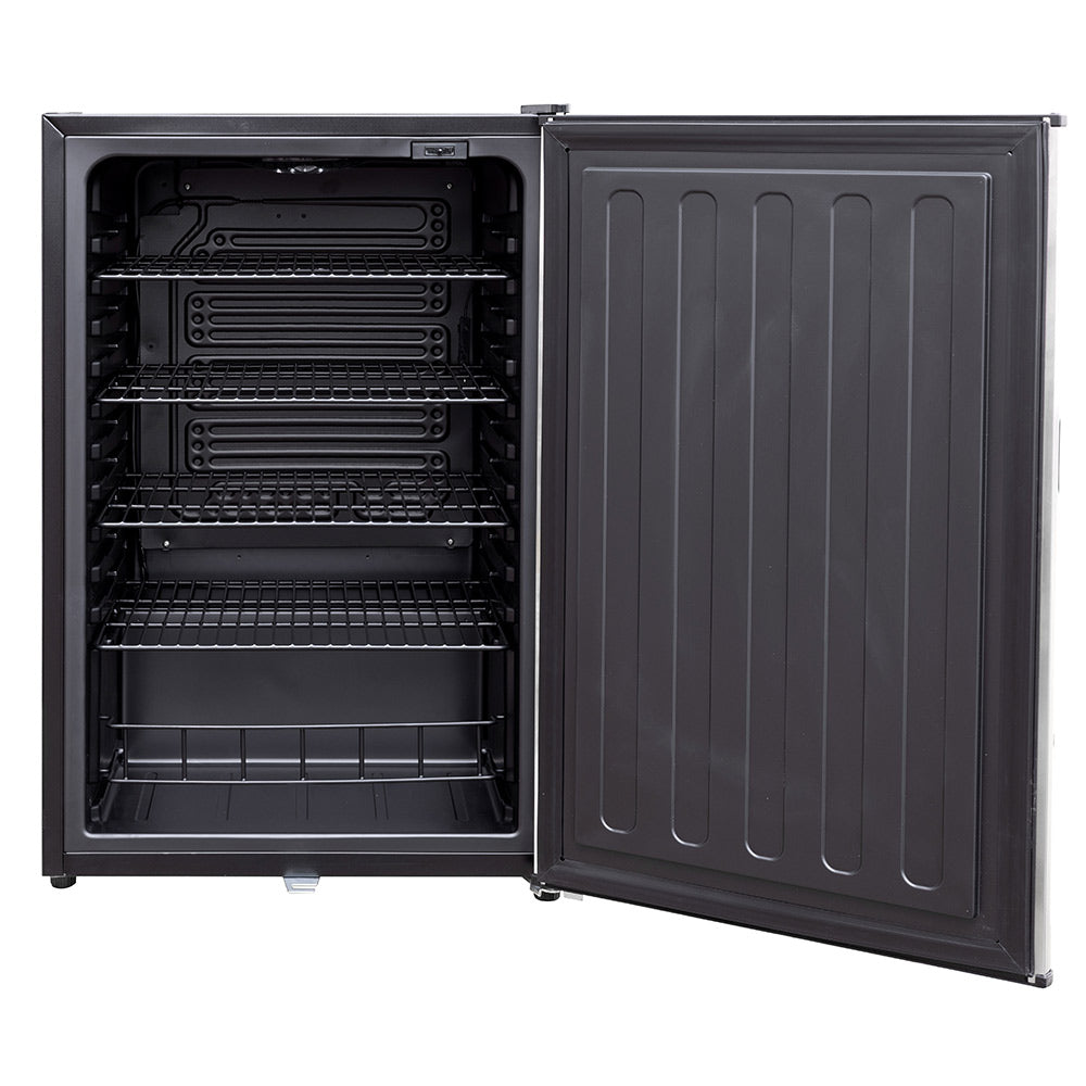Outdoor mini fridge open, showing black interior shelves and hinged door panel.