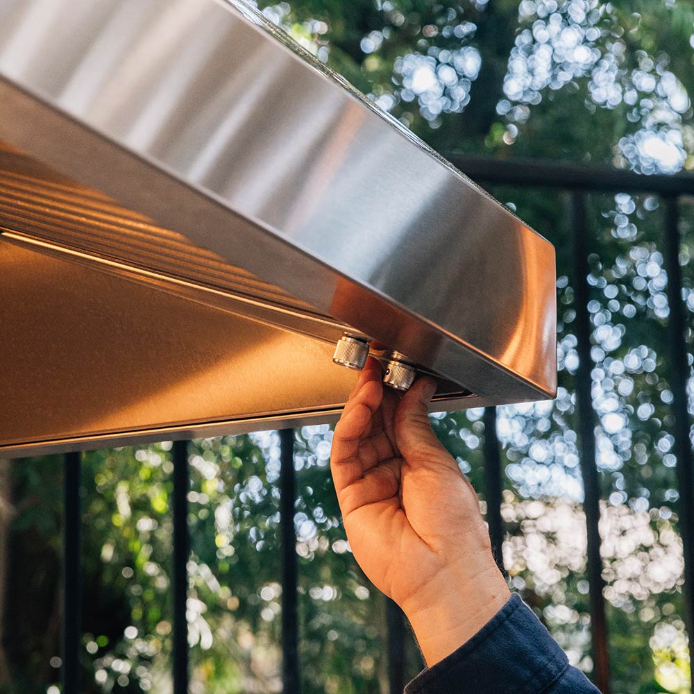 Outdoor vented hood with blower vent, stainless steel hood edge and adjustable bracket