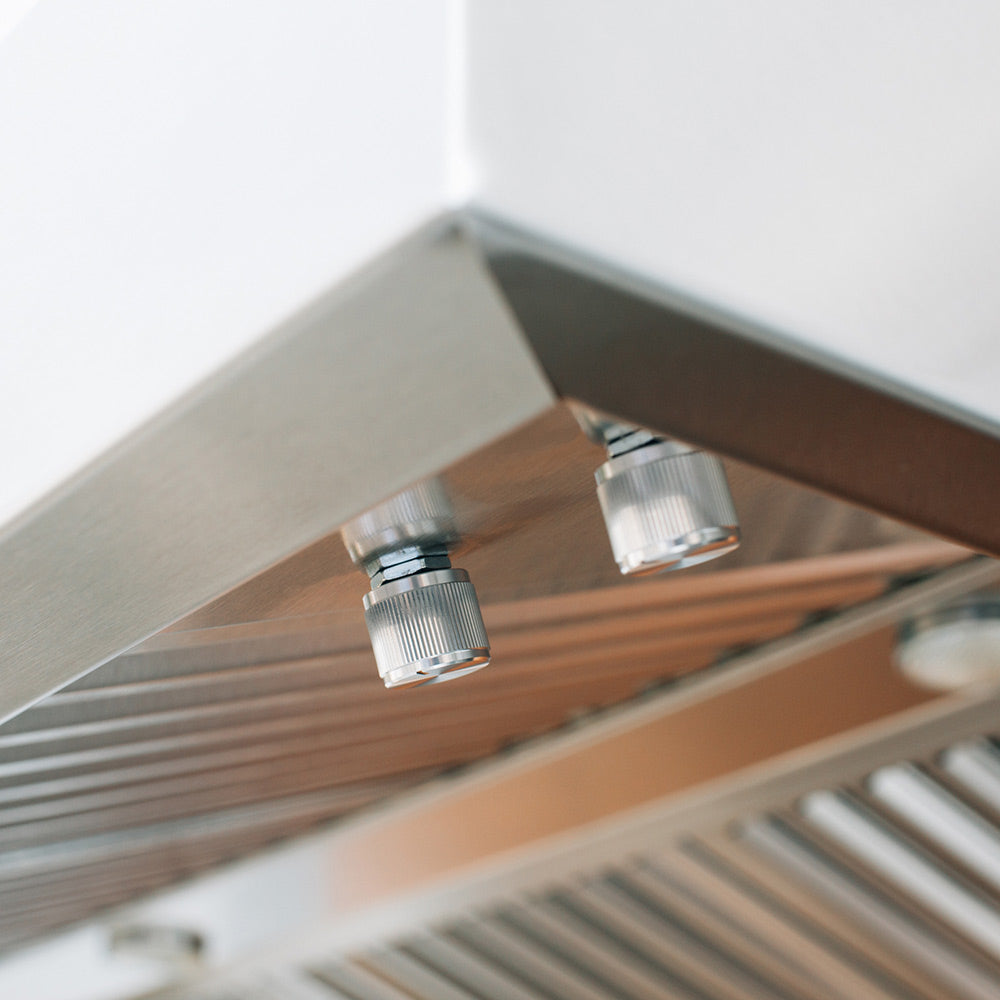 Outdoor vent hood underside with stainless tubes and adjustable valve fittings