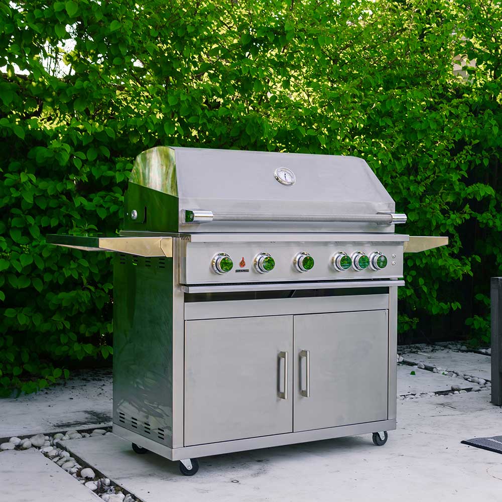 Stainless gas grill on wheeled cart with double cabinet doors and side shelves