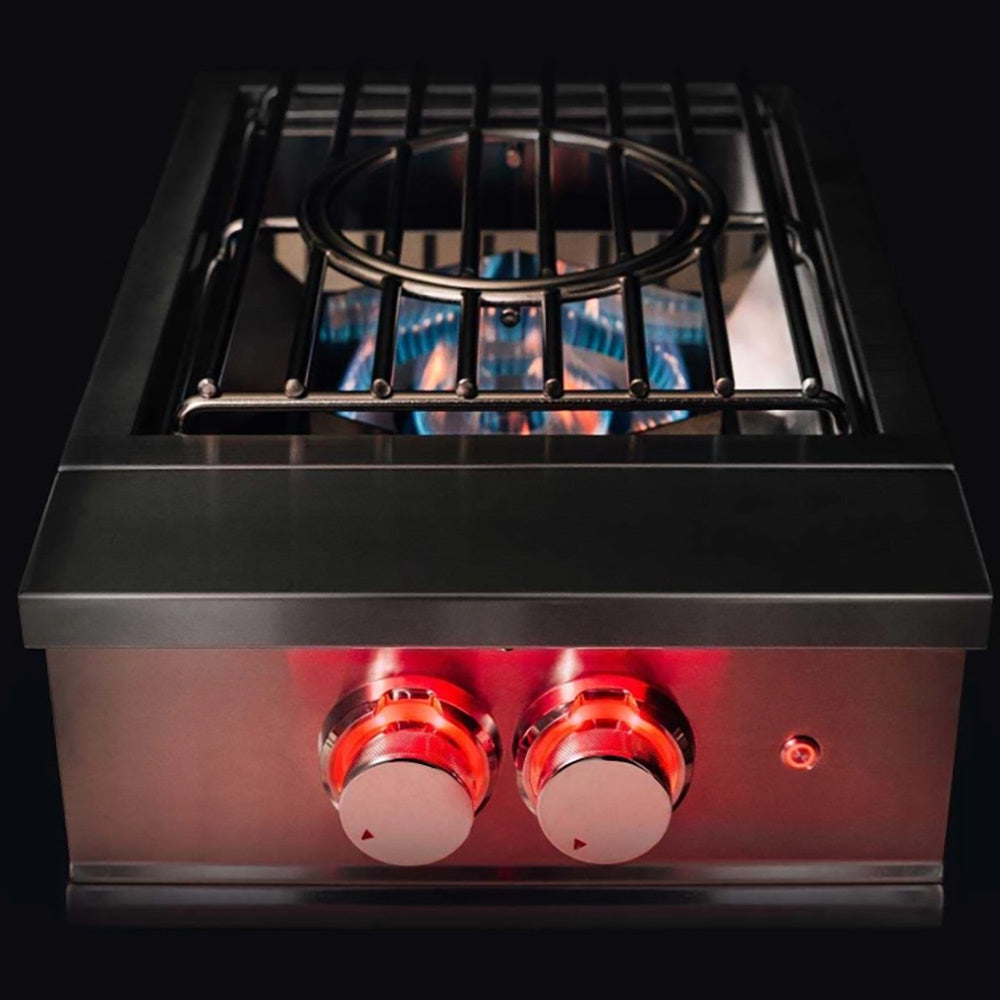 Built-in stainless power burner with glowing burner ring and two red control knobs