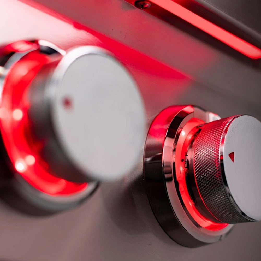 Side burner control knob with red indicator on stainless steel panel