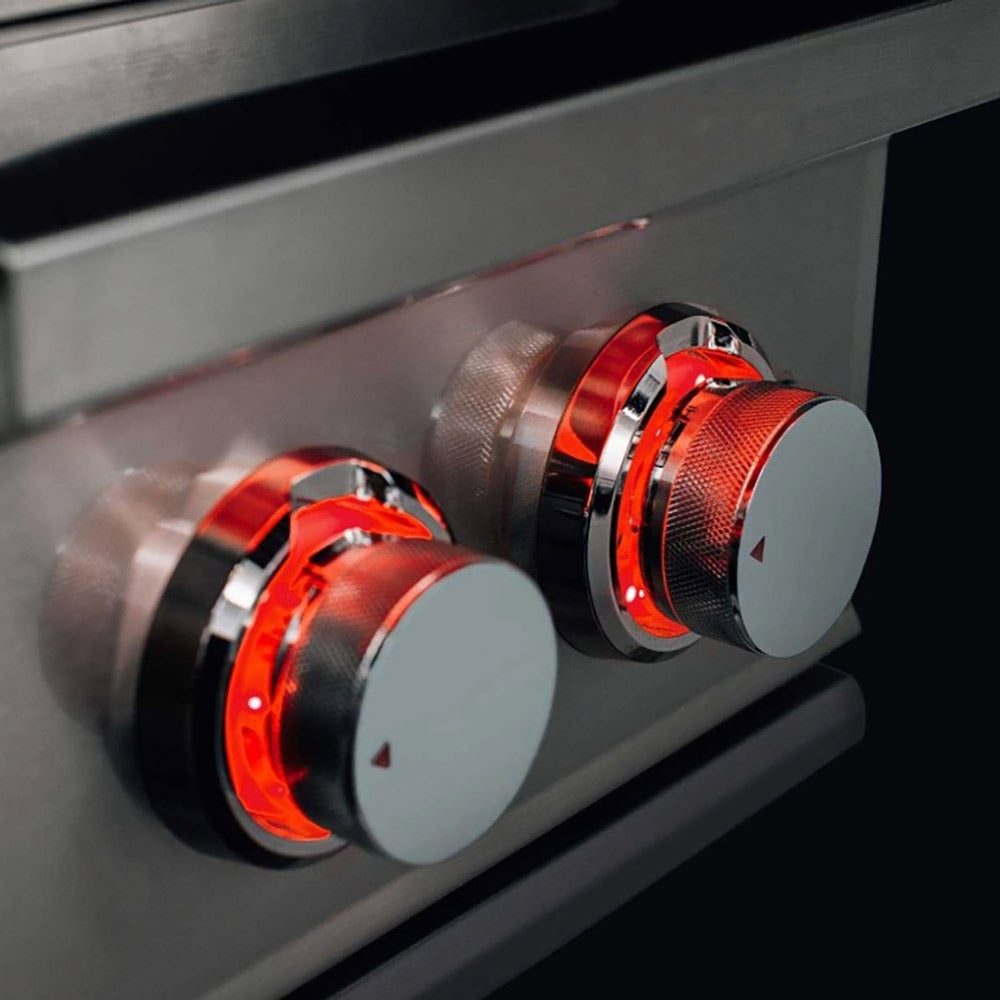 Stainless steel side burner with two red-lit control knobs and textured grip