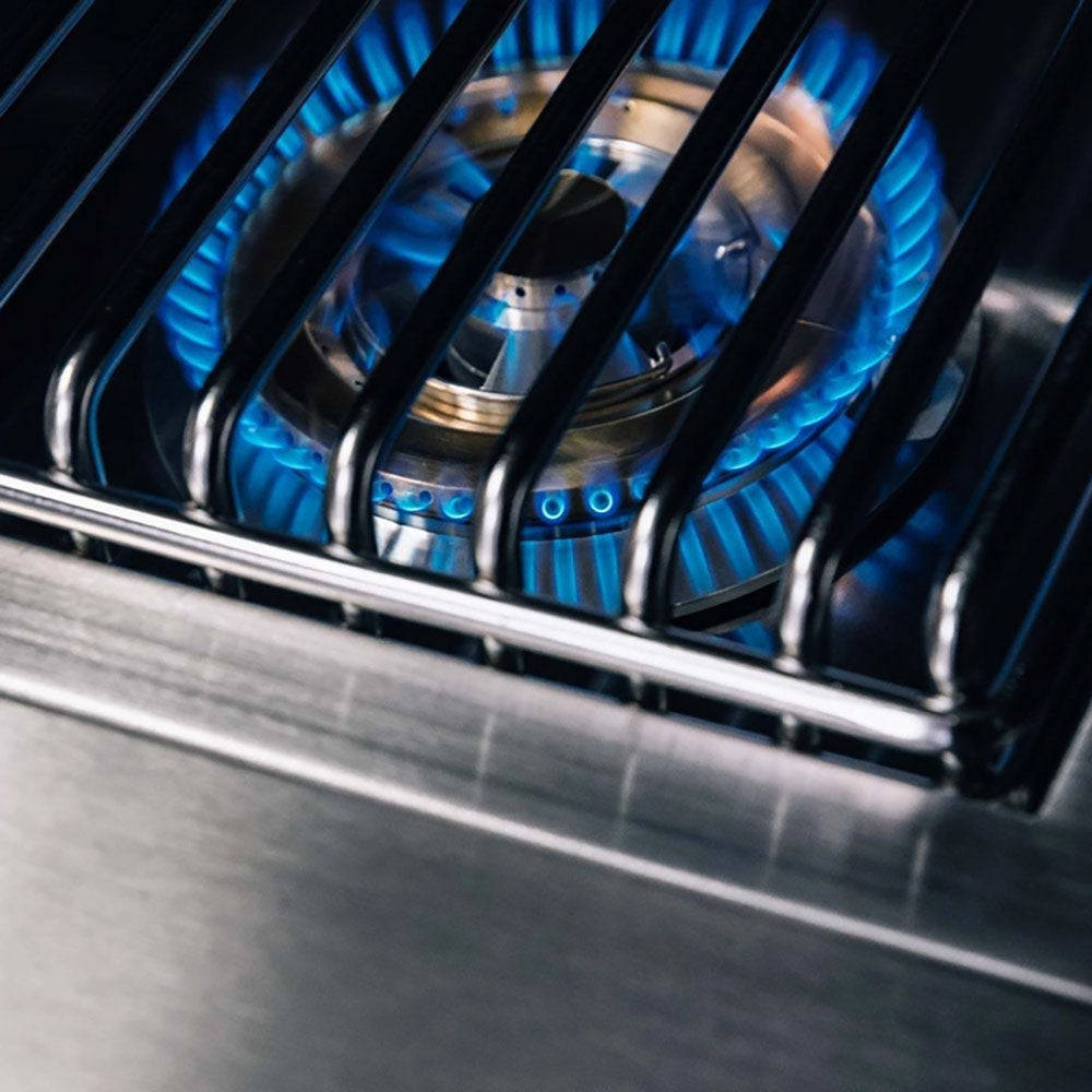 Built-in double side burner ignited with blue gas flames under grate