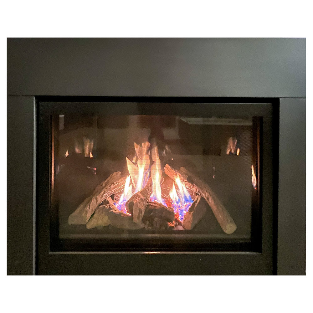 Built-in direct vent gas fireplace with glass front and burning log set