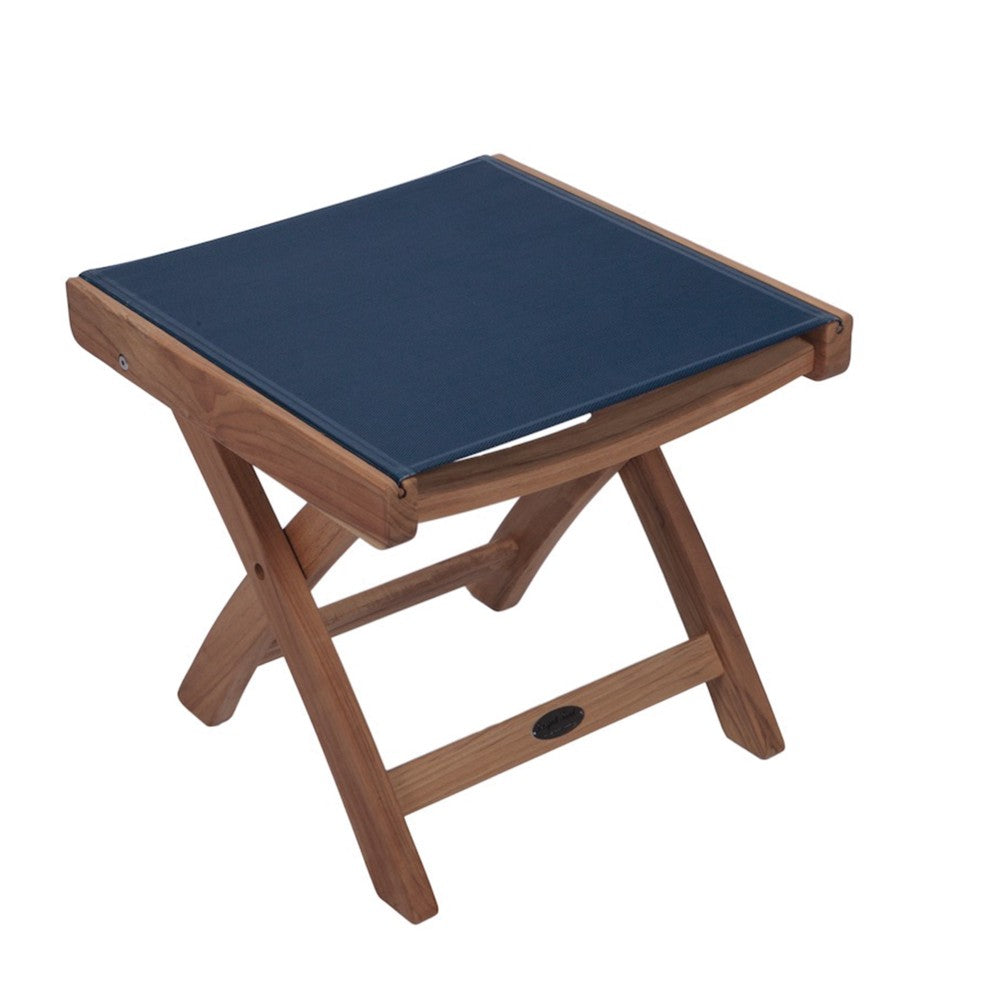 Teak sling footrest with navy fabric cushion and slatted wood frame
