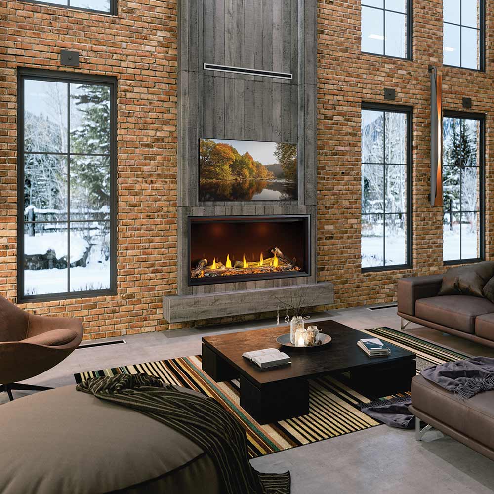 Linear direct vent gas fireplace insert with glowing flames in wall opening, black frame