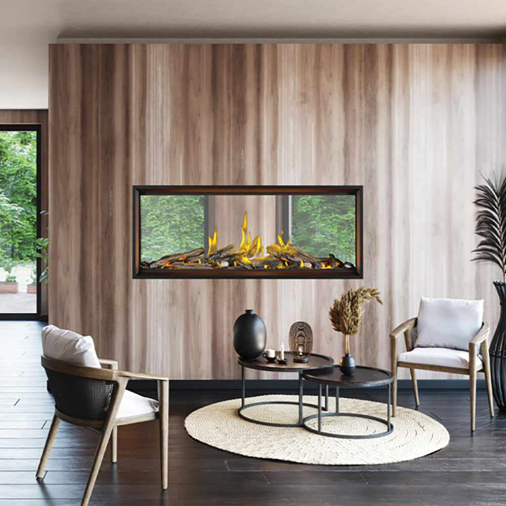 Linear gas fireplace with dark frame, glowing logs and yellow flames visible through glass