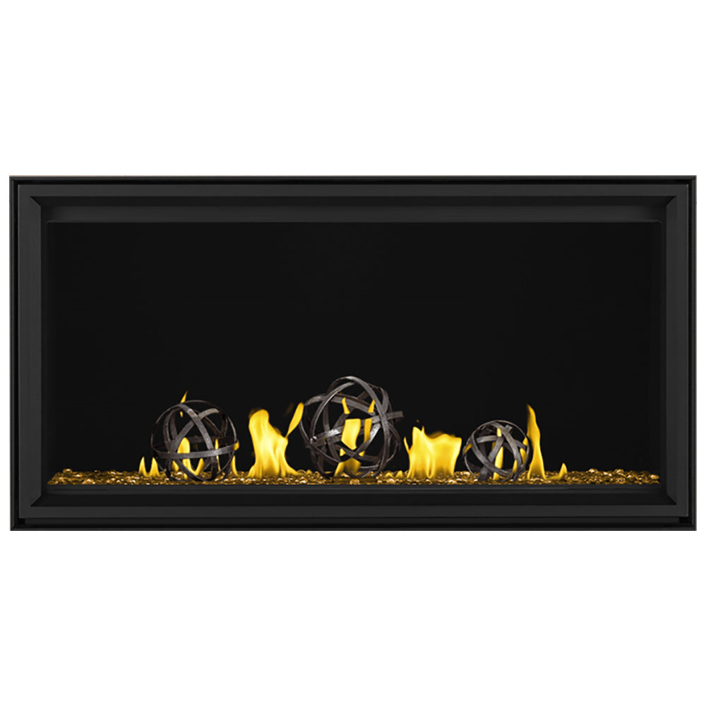 Linear gas fireplace with black frame, yellow flames and iron globes